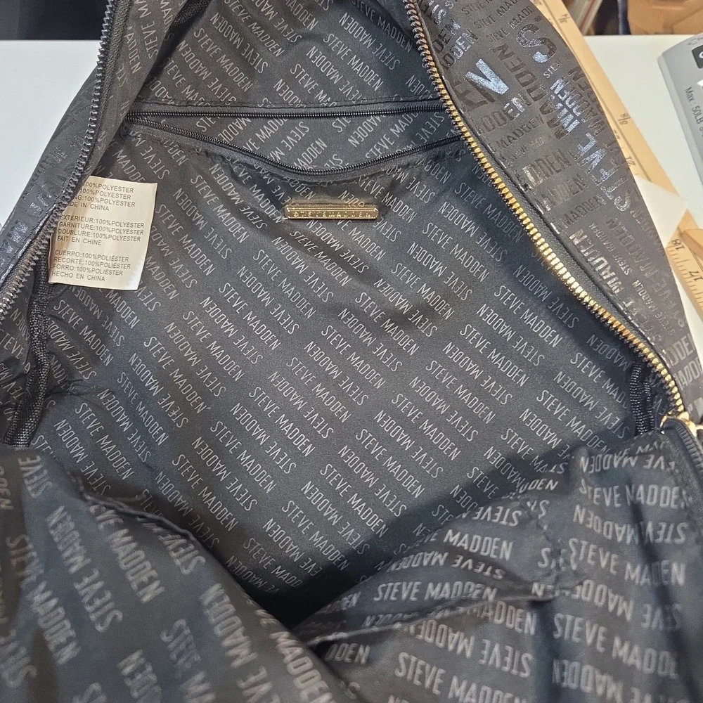 Steve Madden Black Logo Print Backpack Gold Tone Zippers Large Book Travel Bag